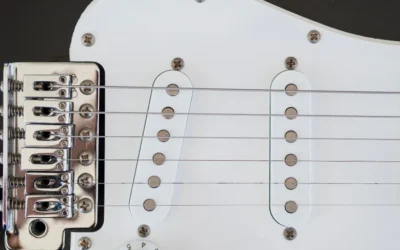 Puente de la guitarra: tipos, ajustes, reparaciones y mantenimiento