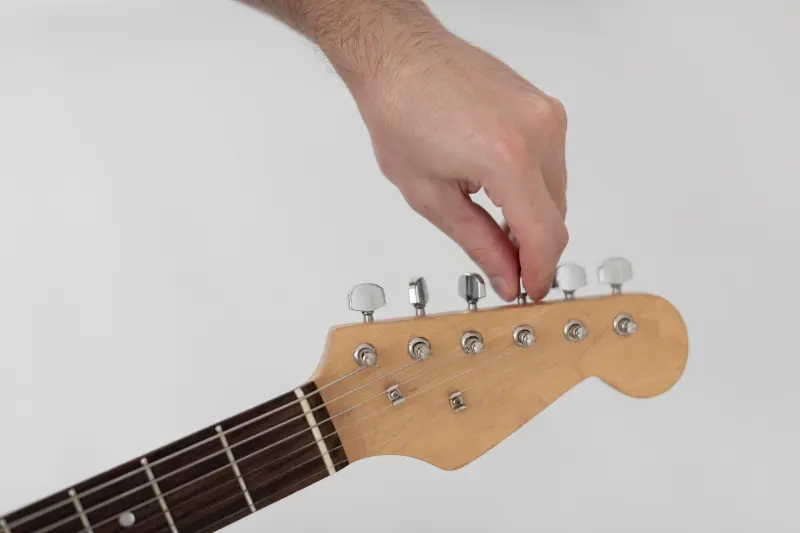 aflojar cuerdas guitarra eléctrica